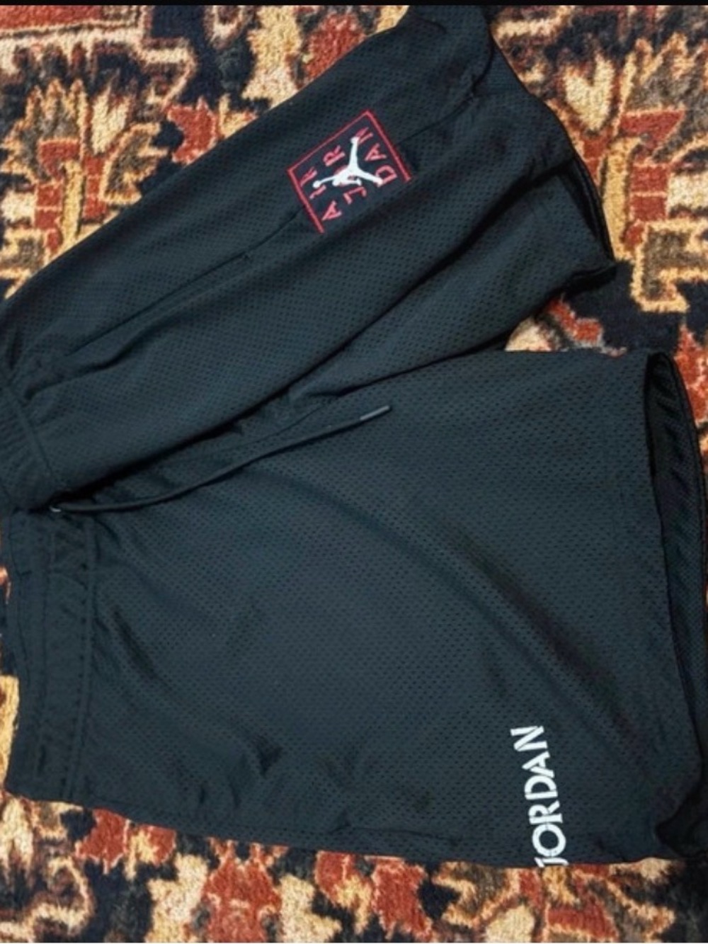 Jordan Men’s Black Athletic Mesh Shorts with Red Logo